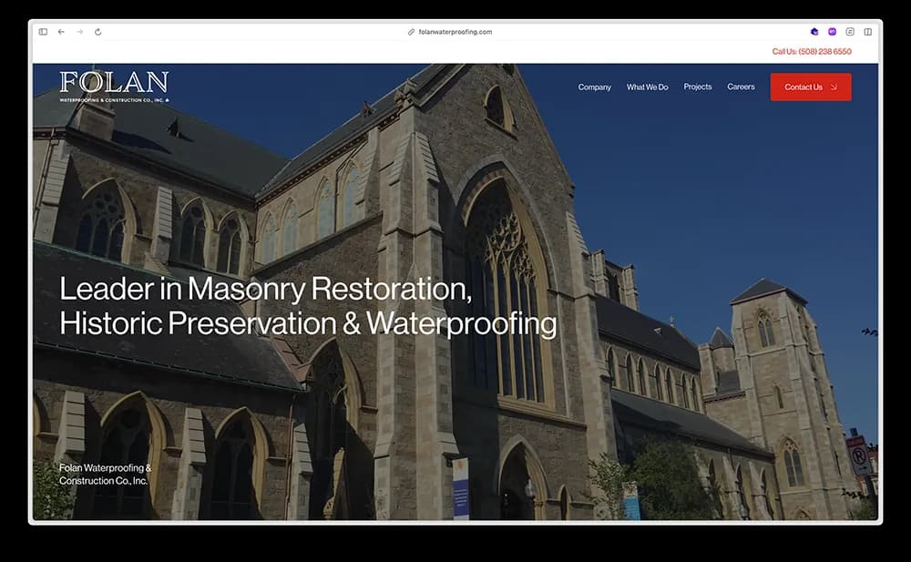 Folan Waterproofing website homepage shown on a laptop